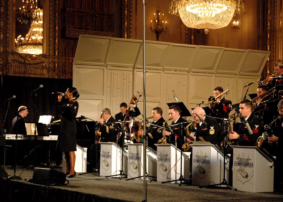 US Navy 061221-N-0773H-063 Chief Musician Yolanda C. Pelzer of the U.S. Navy Band Commodores jazz ensemble sings I'll Take Romance during an evening concert at the Midwest Band and Orchestra Conference