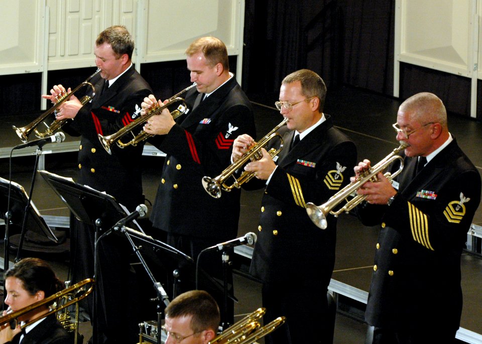 US Navy 061221-N-0773H-048 The trumpet section of the U.S. Navy Band Commodores jazz ensemble perform during an evening concert at the Midwest Band and Orchestra Conference