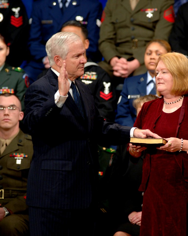 US Navy 061218-D-2987S-020 Becky Gates holds the bible as Vice President Dick Cheney swears in Dr. Robert M. Gates as the 22nd Secretary of Defense