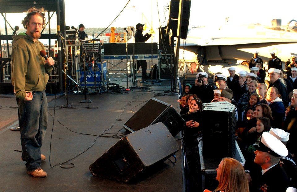 US Navy 061219-N-2959L-783 Winner of the television program Last Comic Standing Josh Blue gets the crowd laughing during a holiday concert aboard the Nimitz-class aircraft carrier USS Ronald Reagan (CVN 76)