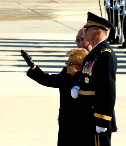 US Navy 070102-F-0194C-060 Former First Lady Betty Ford waves goodbye to her husband, former President Gerald R. Ford, 38th President of the United States, as his casket is loaded onto Air Force One