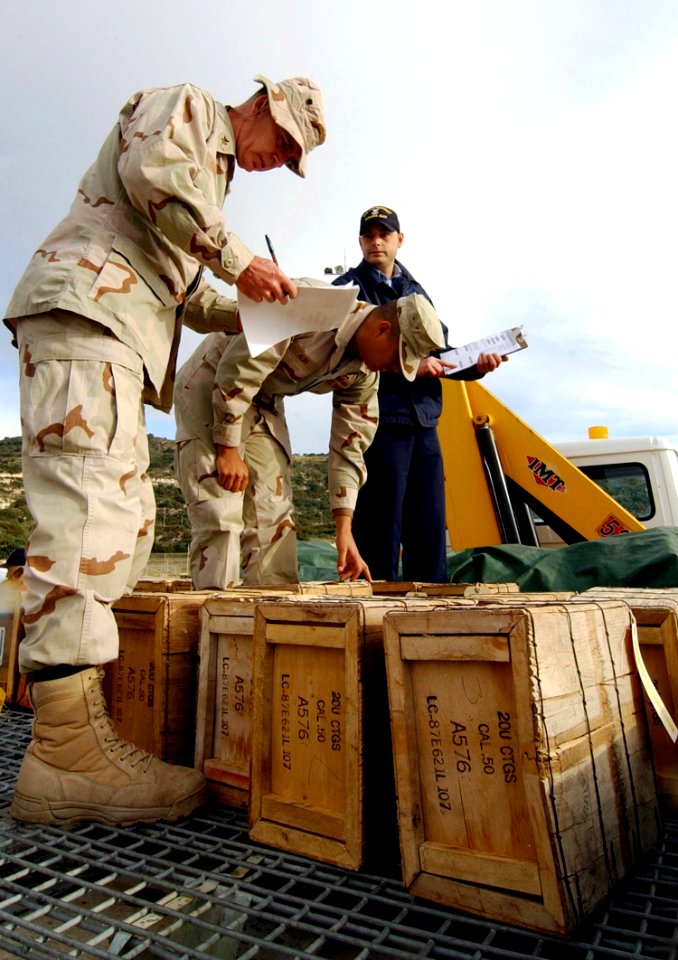 US Navy 070104-N-0780F-001 A Sailor assigned to Alpha Team, Embarked Security Detachment Two Two Three (ESD-223), checks the ammunition inventory for his unit prior to embarking aboard Condock V