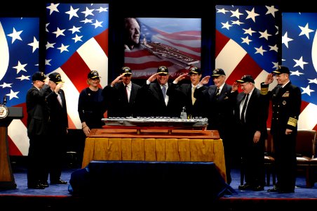 US Navy 070116-N-3642E-171 SECNAV Dr. Donald C. Winter, Vice President Dick Cheney, Susan Ford Bales, Jack Ford, Mike Ford, Steve Ford, Sen. John Warner, Sen. Carl Levin and CNO Adm. Mike Mullen salute as the model of USS Geral