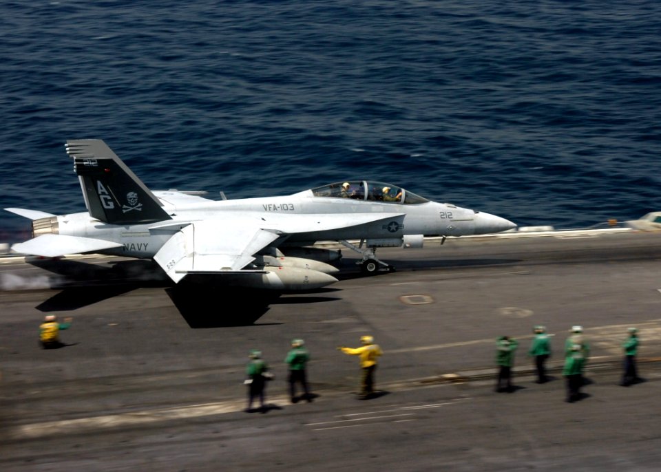 US Navy 070112-N-8907D-003 An F-A-18F Super Hornet assigned to the Jolly Rogers of Strike Fighter Squadron One Zero Three (VFA-103) launches from the flight deck of the Nimitz-class aircraft carrier USS Dwight D. Eisenhower (CV