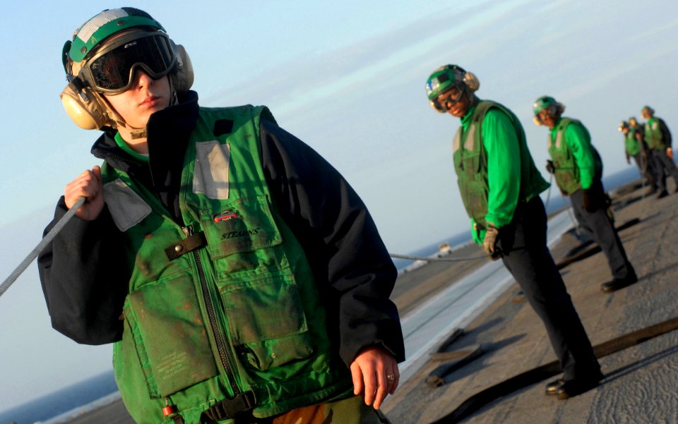 US Navy 070113-N-5345W-005 Sailors assigned to air department's launch and recovery division man the safety line while no-load tests are performed on catapult number two on the flight deck of the Nimitz-class aircraft carrier U