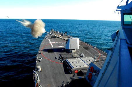 US Navy 070111-N-4515N-509 Guided missile destroyer USS Forest Sherman (DDG 98) test fires its five-inch gun on the bow of the ship during training