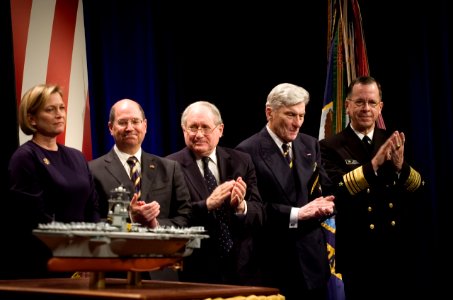 US Navy 070116-N-0696M-095 Secretary of the Navy Donald C. Winter, Sen. Carl Levin, Sen. John Warner and Chief of Naval Operations Adm. Mike Mullen applaud Susan Ford Bates after her remarks at the unveiling and naming of USS G