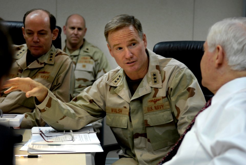 US Navy 070118-D-7203T-004 Secretary of Defense Robert Gates receives a briefing from Commander U.S. Naval Forces Central Command, Vice Adm. Patrick Walsh