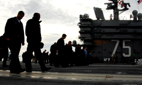 US Navy 070112-N-8923M-072 Sailors check for debris during a foreign object damage (FOD) walk down on the flight deck of the Nimitz-class aircraft carrier USS Harry S. Truman (CVN 75). Truman is currently underway conducting fl