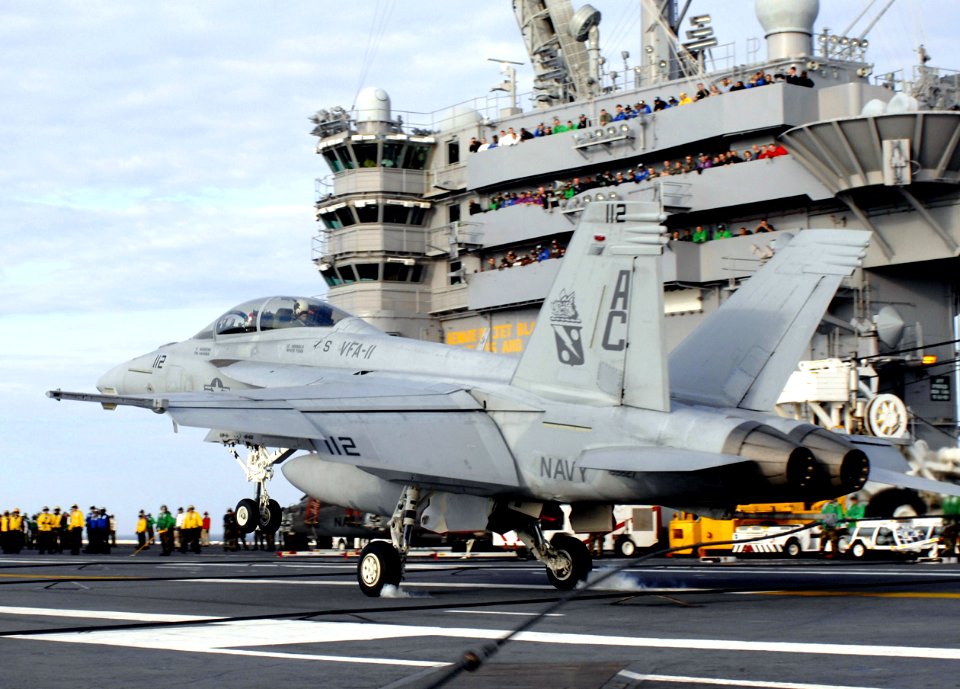 US Navy 070113-N-5345W-015 An F-A-18F Super Hornet assigned to the Red Rippers of Strike Fighter Squadron Eleven (VFA-11) touches down on the flight deck of USS Harry S. Truman (CVN 75)
