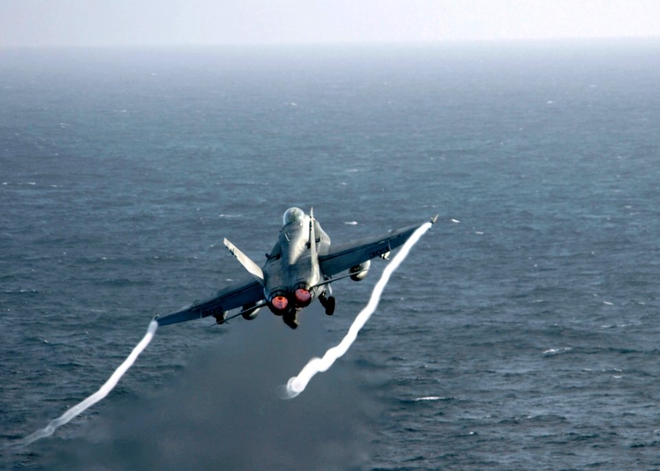 US Navy 070121-N-8907D-001 An F-A-18C Hornet attached to the Rampagers of Strike Fighter Squadron Eight Three (VFA-83) launches from the flight deck