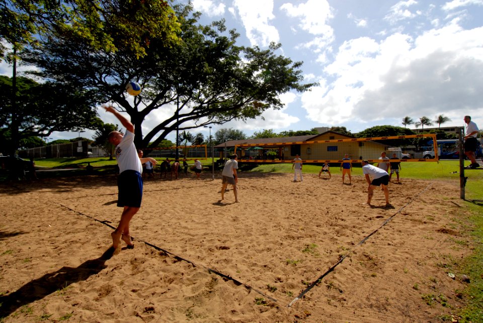 US Navy 070118-N-4965F-002 A Sailor jump serves the ball during a volleyball tournament on board Naval Station Pearl Harbor during the annual Surface Navy Association, Surface Line Week