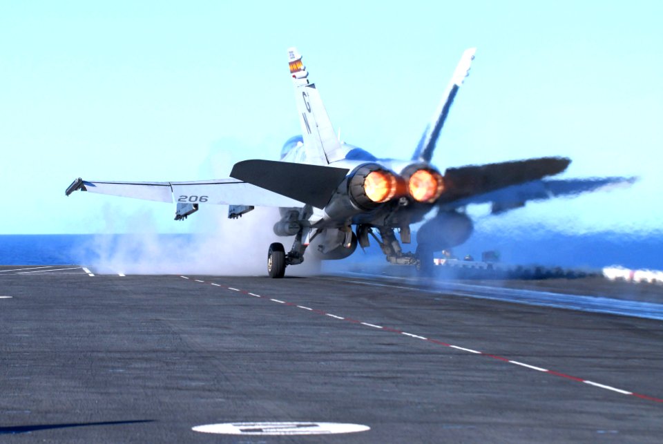 US Navy 070122-N-0684R-093 An F-A-18C Hornet assigned to the Death Rattlers of Marine Fighter Attack Squadron Three Two Three (VMFA-323) launches from the flight deck of the Nimitz-class aircraft carrier USS John C. Stennis (CV