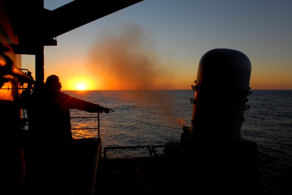 US Navy 070122-N-2659P-089 Fire Controlman Chief Sean Cartney signals the final count of a Close In Weapons System (CIWS) 20mm phalanx gatling gun, during a live fire exercise
