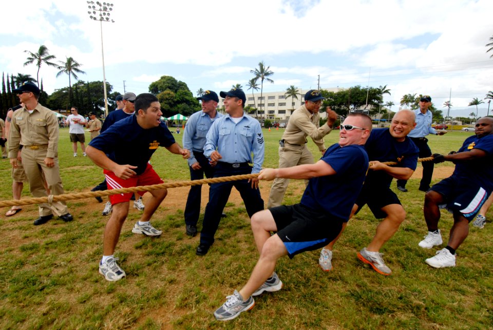 US Navy 070119-N-4965F-035 Sailors assigned to Oliver Hazard Perry-class guided-missile frigate USS Crommelin (FFG 37) are encouraged by their shipmates as they compete in a tug-o-war competition