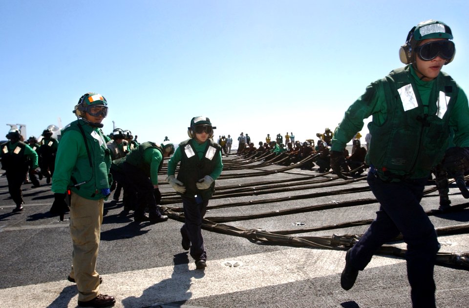 US Navy 070202-N-4009P-026 Sailors on the flight deck of USS Ronald Reagan (CVN 76) participate in a mass casualty drill