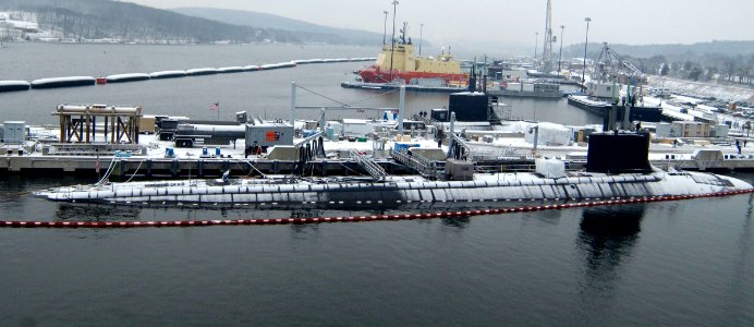 US Navy 070202-N-8467N-001 An aerial view of attack submarine USS Virginia (SSN 774), bottom, and fast attack submarine USS Connecticut (SSN 22) moored to the pier at Submarine Base New London photo