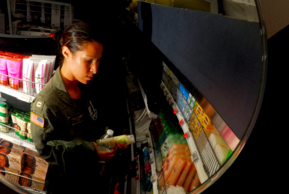 US Navy 070126-N-9928E-032 Lt. Mary Erausguin shops for products in the ship's store aboard the Nimitz-class aircraft carrier USS John C. Stennis (CVN 74)