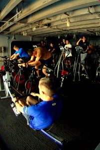 US Navy 070130-N-0684R-034 Sailors take time out of their day to maintain physical readiness by using cardiovascular equipment on the starboard side sponson aboard Nimitz-class aircraft carrier USS John C. Stennis (CVN 74)