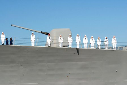 US Navy 070203-N-4965F-020 Sailors aboard guided missile destroyer USS Russell (DDG 59) man the rails as the ship gets underway from Naval Station Pearl Harbor