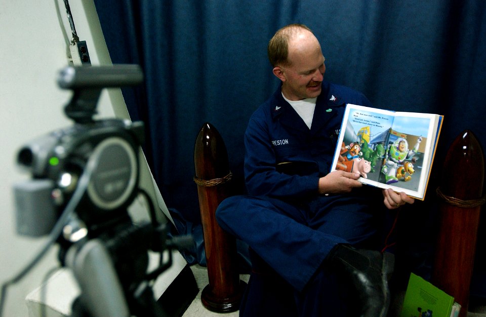 US Navy 070129-N-4776G-070 Aviation Structural Mechanic 3rd Class Jeremy Preston, from Salt Lake City, participates in the United Through Reading program on board USS Ronald Reagan (CVN 76)