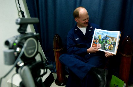 US Navy 070129-N-4776G-070 Aviation Structural Mechanic 3rd Class Jeremy Preston, from Salt Lake City, participates in the United Through Reading program on board USS Ronald Reagan (CVN 76)