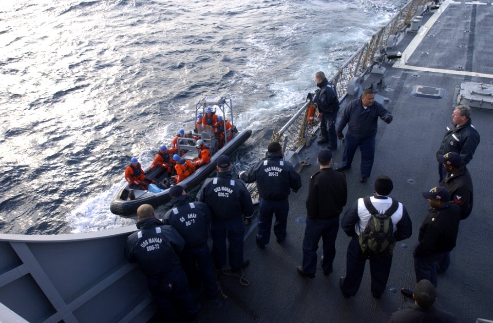 US Navy 070130-N-5459S-023 Sailors assigned to German navy destroyer Saschen (F 219) pull alongside the guided missile destroyer USS Mahan (DDG 72) in a Rigid Hull Inflatable Boat (RHIB) during a training exercise in the Atlant