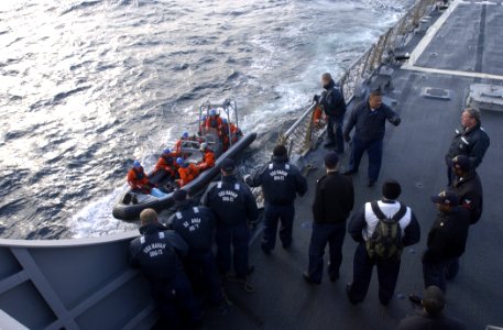 US Navy 070130-N-5459S-023 Sailors assigned to German navy destroyer Saschen (F 219) pull alongside the guided missile destroyer USS Mahan (DDG 72) in a Rigid Hull Inflatable Boat (RHIB) during a training exercise in the Atlant