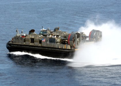 US Navy 070204-N-6710M-007 Dock landing ship USS Tortuga (LSD 46) and the Essex Amphibious Ready Group (ESXARG) conduct Landing Craft Air Cushion (LCAC) operations during Blue-Green exercises