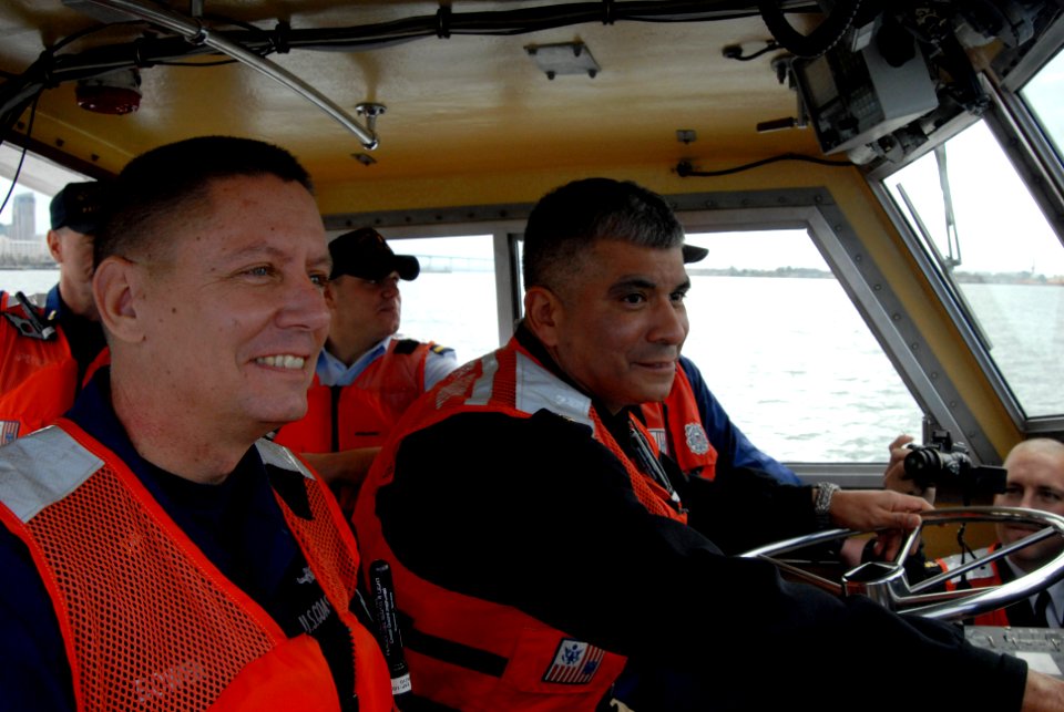 US Navy 070201-C-8227J-002 Master Chief Petty Officer of the Navy (MCPON) Joe R. Campa Jr. takes the wheel of a 41-foot Coast Guard rescue boat as Master Chief Petty Officer of the Coast Guard Charles
