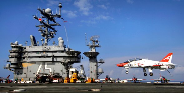 US Navy 070203-N-5345W-037 A T-45 Goshawk assigned to Training Airwing Two (TRAWING-2), descends toward the landing area for an arrested recovery aboard Nimitz-class aircraft carrier USS Harry S. Truman (CVN 75)