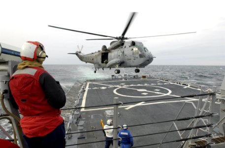 US Navy 070129-N-5459S-029 A Canadian H-3 Sea King lands aboard guided missile cruiser USS Mahan (DDG 72) during a training exercise in the Atlantic Ocean