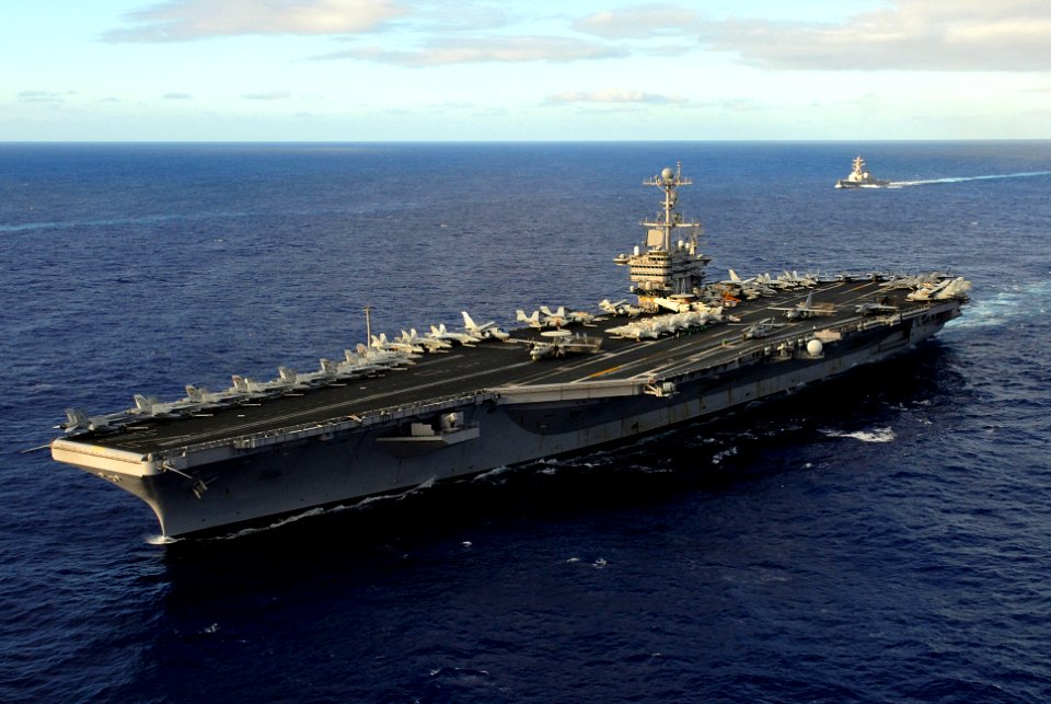 US Navy 070206-N-0684R-349 USS John C. Stennis (CVN 74) and guided missile destroyer USS O'Kane (DDG 77) move into formation in preparation for a photo exercise along with USS Preble (DDG 88), USS Antietam (CG 54) and USNS Brid