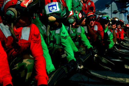 US Navy 070203-N-0684R-033 Sailors assigned to the air department stand by for instructions prior to rigging the barricade during flight deck drills aboard Nimitz-class aircraft carrier USS John C. Stennis (CVN 74)