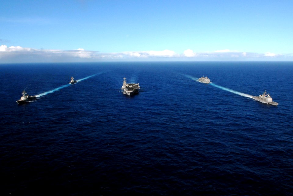 US Navy 070206-N-3729H-559 The Nimitz-class aircraft carrier USS John C. Stennis (CVN 74) and the entire John C. Stennis Carrier Strike Group (JCSSG), transit in formation during a photo exercise showcasing the Stennis Carrier