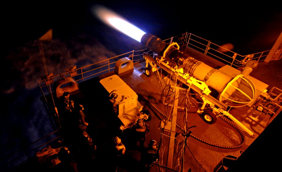 US Navy 070204-N-5345W-273 An engine from an F-A-18C Hornet is taken to full afterburner during a test by Aircraft Intermediate Maintenance Department's (AIMD) jet shop on the fantail of USS Harry S. Truman (CVN 75)