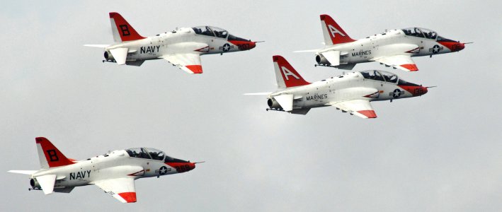 US Navy 070204-N-8923M-174 Four T-45 Goshawks assigned to Training Airwing Two (TRAWING-2) perform a high-speed fly-by off the port side of the Nimitz-class aircraft carrier USS Harry S. Truman (CVN 75)