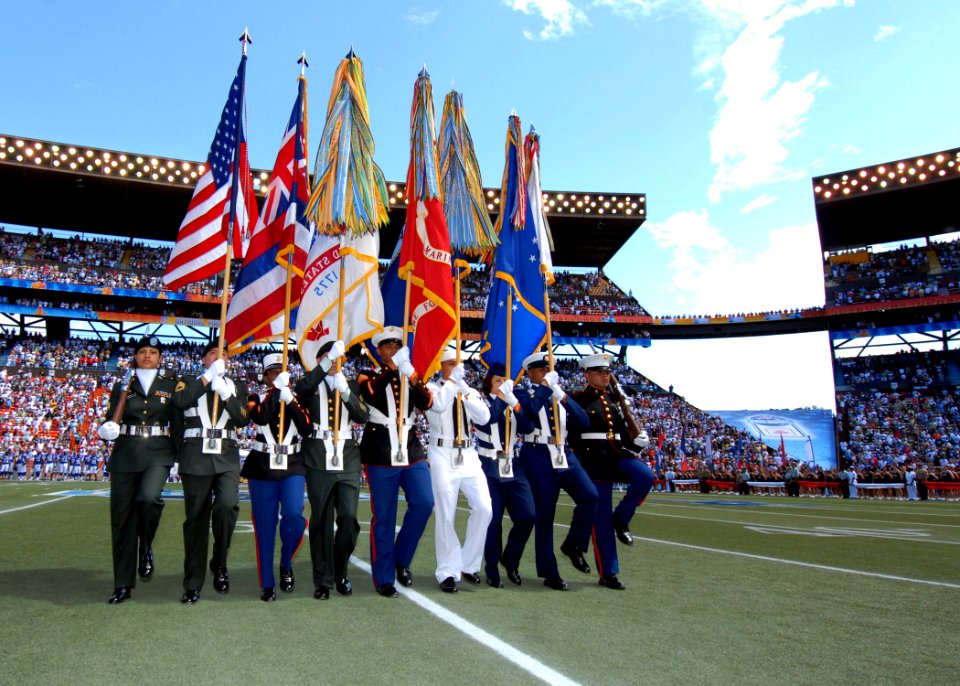 US Navy 070210-N-4965F-001 A joint service color guard parades the colors at mid-field during the National Football League's 2007 Pro Bowl game at Aloha Stadium in Honolulu, Hawaii