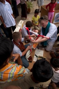 US Navy 070211-N-8534H-017 USS Gary (FFG 51) Sailors construct a scooter for the children of the Village D'enfants De Sihanoukville Orphanage