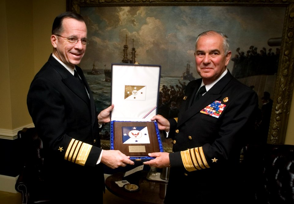 US Navy 070213-N-0696M-151 Chief of Naval Operations (CNO) Adm. Mike Mullen presents Commander-in-Chief, Chilean Navy, Adm. Rodolfo Codina Diaz, with a gift at the conclusion of an office visit to the Pentagon