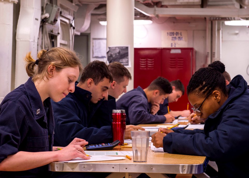 USS Fitzgerald Sailors take the E-4 advancement exam 160317-N-GW139-016