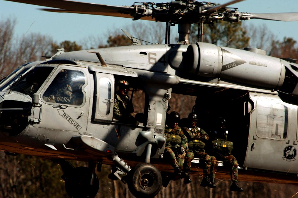 US Navy 070208-N-7918H-786 An MH-60S Seahawk, assigned to the Chargers of Helicopter Combat Support Squadron Two Six (HSC-26), takes off with Sailors assigned to Explosive Ordnance Disposal Unit Two (EODMU-2)
