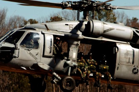 US Navy 070208-N-7918H-786 An MH-60S Seahawk, assigned to the Chargers of Helicopter Combat Support Squadron Two Six (HSC-26), takes off with Sailors assigned to Explosive Ordnance Disposal Unit Two (EODMU-2)