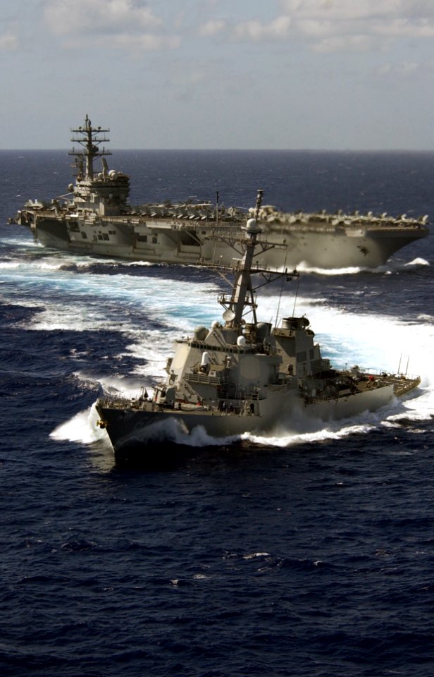 US Navy 070209-N-5961C-004 After receiving thousands of gallons of fuel during a fueling at sea (FAS), guided missile destroyer USS Paul Hamilton (DDG 60) pulls clear of the Nimitz-class aircraft carrier USS Ronald Reagan (CVN