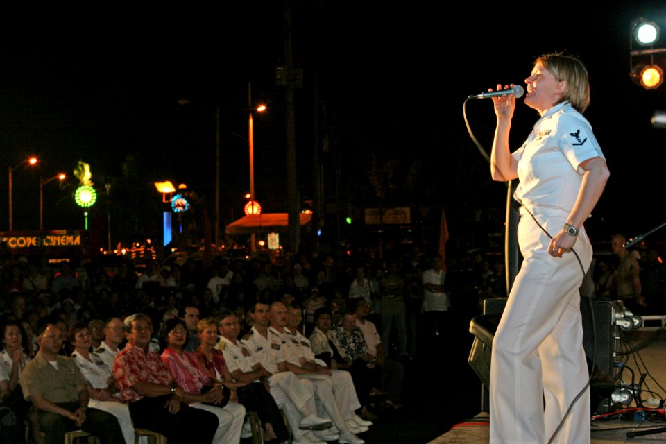 US Navy 070209-N-1113S-012 Musician 3rd Class Jessica Hatfield sings in front of a large audience during a joint U.S. 7th Fleet Band and Philippine Navy Band concert, held at Rajah Sulayman Park