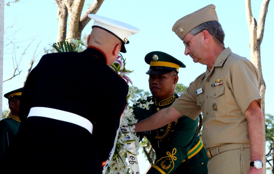 US Navy 070209-N-1113S-002 Commander, U.S. 7th Fleet, Vice Adm. Doug Crowder lays a wreath with a Philippine soldier and an U.S. Marine