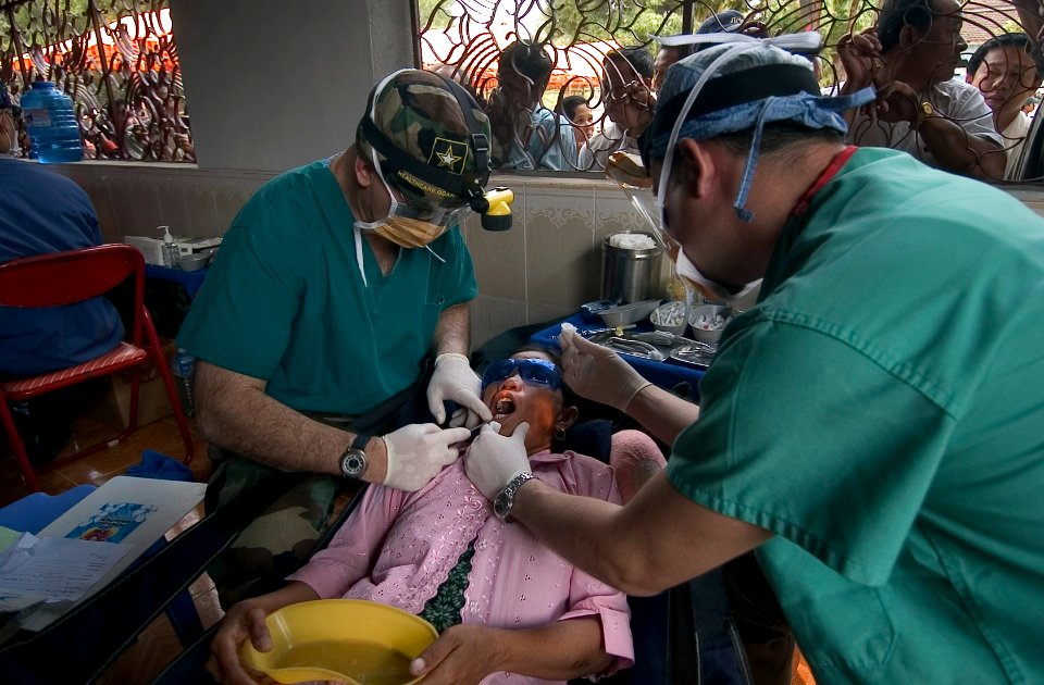 US Navy 070210-N-8534H-013 The guided-missile frigate USS Gary (FFG 51) and U.S. personnel provide local Cambodian nationals medical and dental treatment during a medical and dental community relations activity