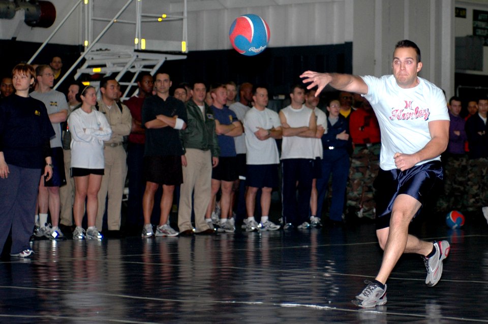 US Navy 070211-N-9760Z-092 Yeoman 3rd Class Sean Rogers participates in a dodgeball tournament sponsored by Morale, Welfare and Recreation (MWR) aboard the nuclear-powered aircraft carrier USS Nimitz (CVN 68)