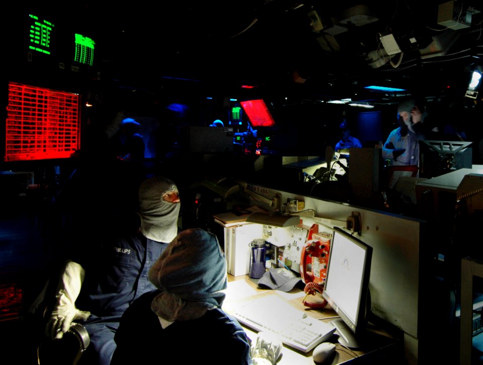 US Navy 070213-N-1328S-002 Sailors aboard the amphibious assault ship USS Boxer (LHD 4) man their battle stations in the ship's Combat Information Center during a general quarters drill