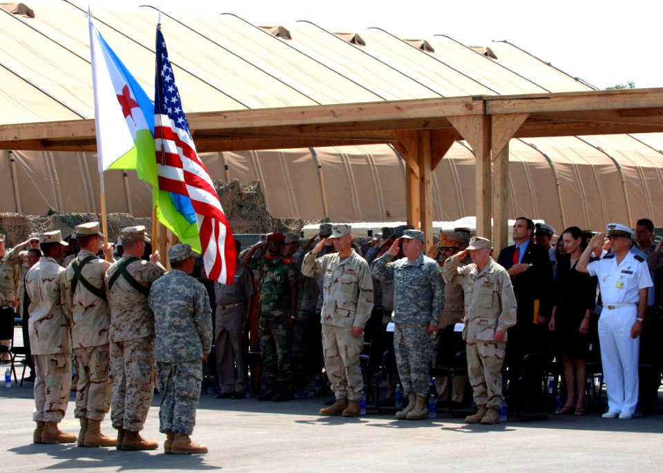 US Navy 070214-F-8043B-104 Outgoing Combined Joint Task Force-Horn of Africa Commander (CJTF-HOA), U.S. Rear Adm. Richard Hunt, Commander U.S. Central Command, U.S. Army Gen. John Abizaid, and incoming CJTF-HOA Commander, U.S